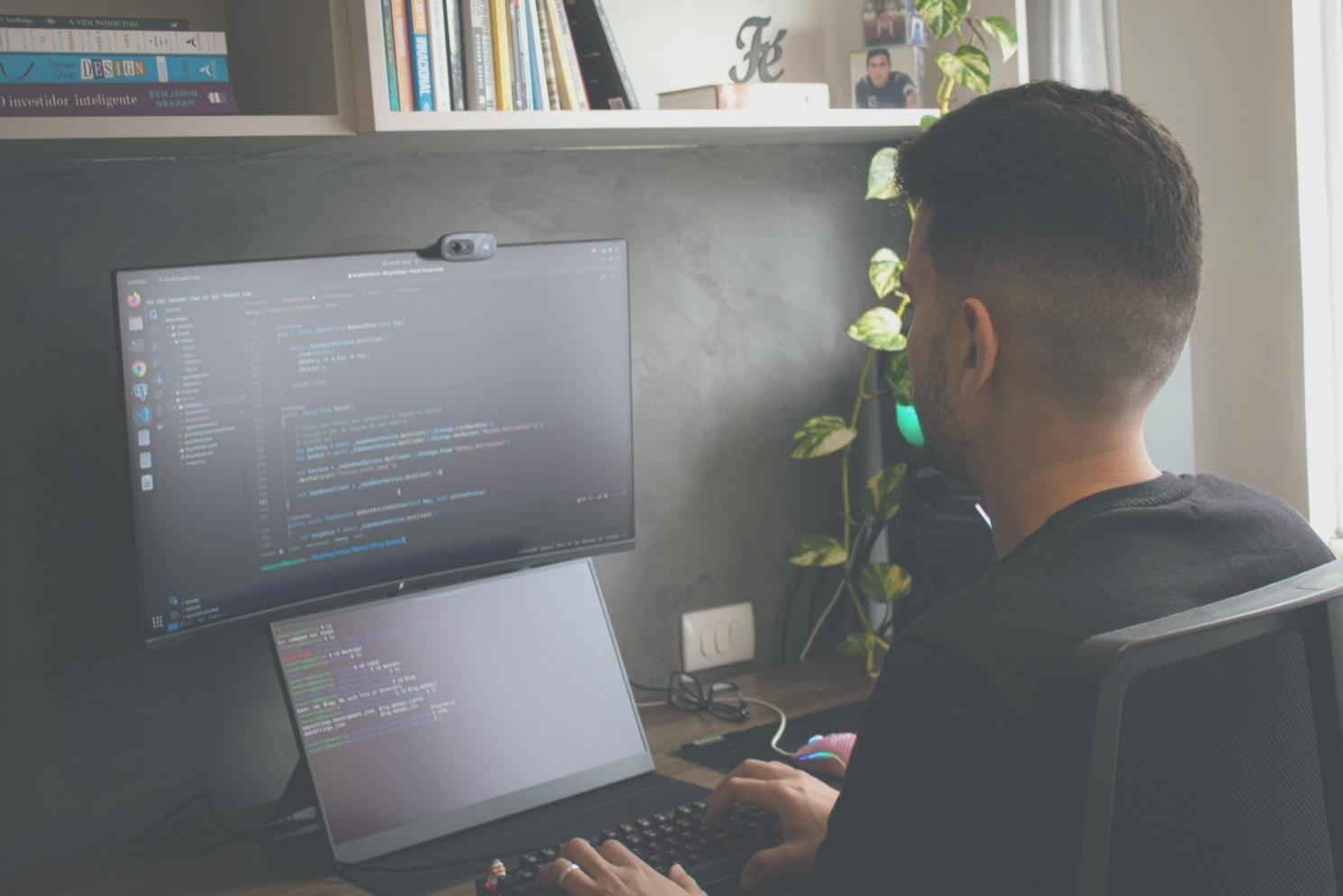 Web developer testing website accessibility features on multiple devices